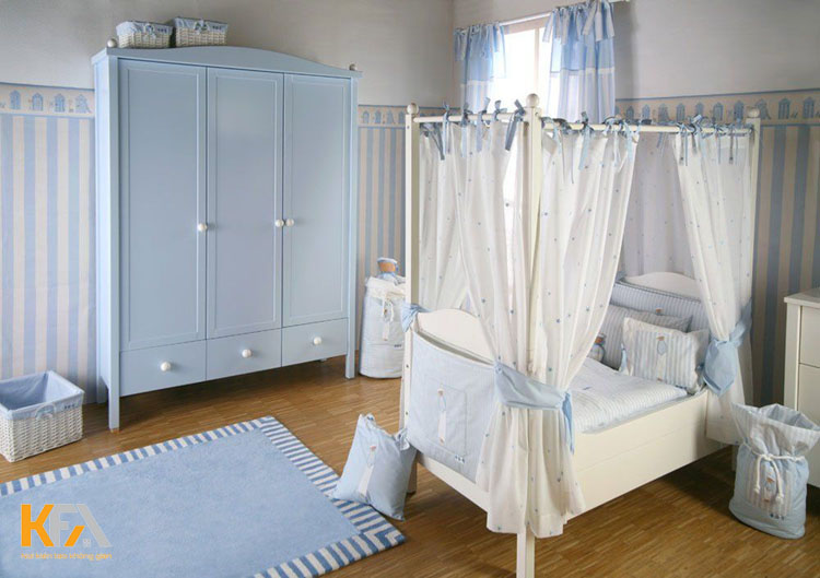 Mẫu thiết kế phòng ngủ cho bé trai sơ sinh với tông màu xanh chủ đạo