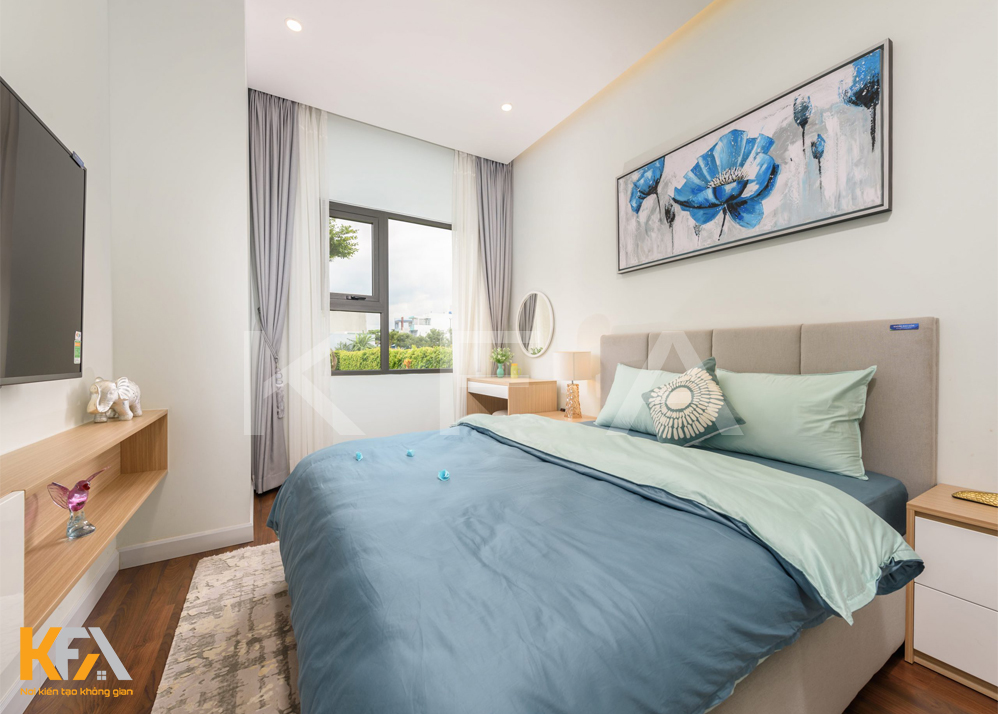 Phòng ngủ là một thiết kế đơn giản, giường ngủ sử dụng gam màu xanh chủ đạo của căn phòng thêm phần trẻ trung và thu hút
